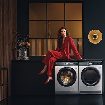 Femme sur une machine à laver